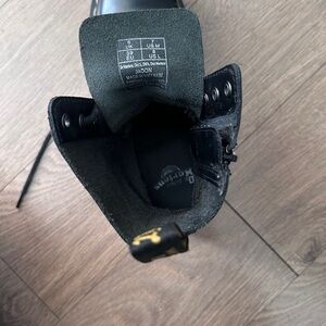 Dr. Martens Black Leather Boots with Yellow Accents